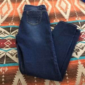 EUC dark wash stretch skinny jeans.